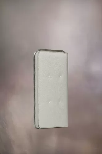 Portefeuille zippé à quatre points